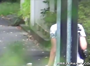 Japanese teen pissing outdoors