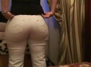 Big juicy ass milf in white jeans. Oda from dates25.com